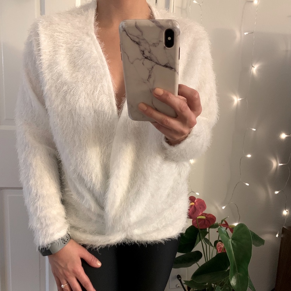 Jennifer Lopez white faux fur sweater
